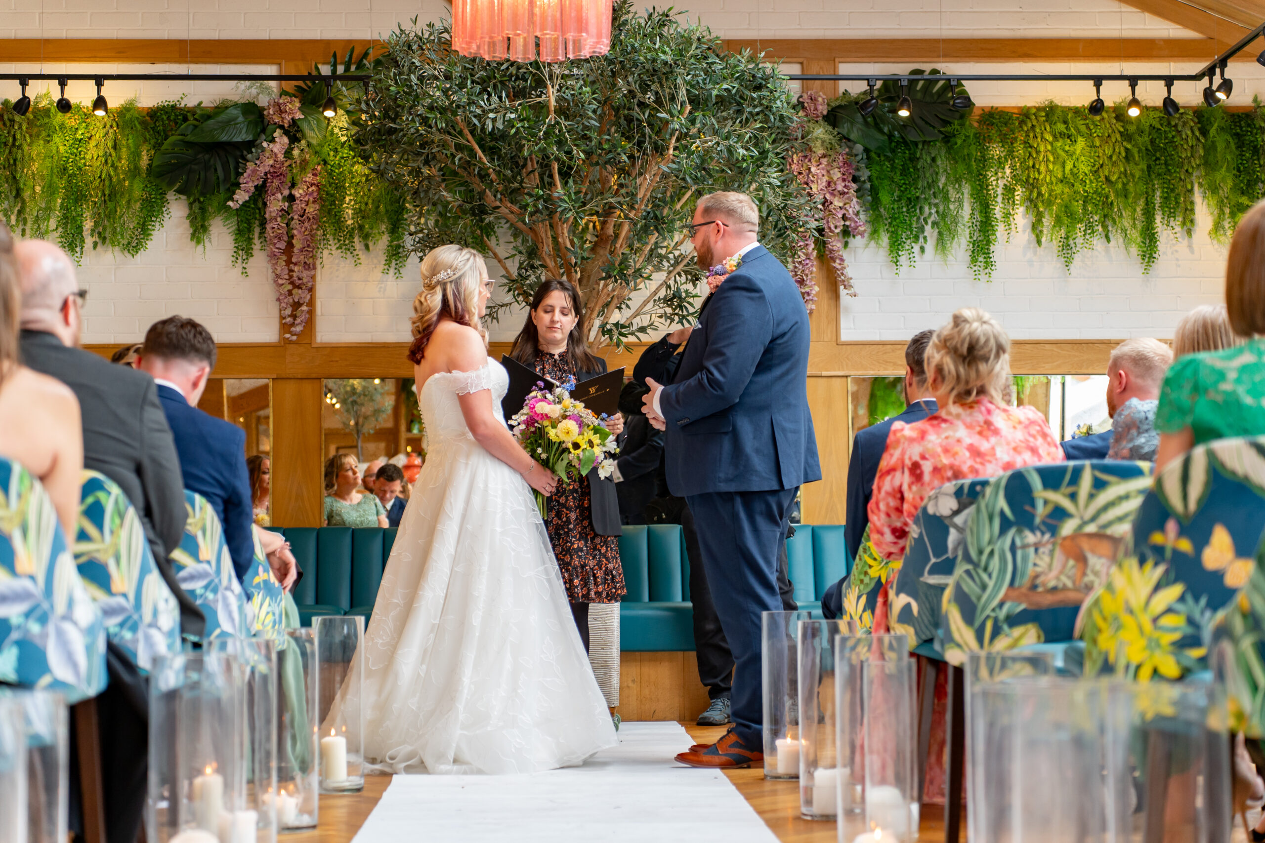 Bride and groom during indoor wedding ceremony